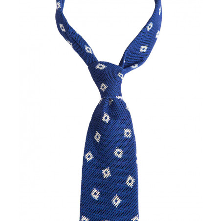 Blue tie with a geometric pattern