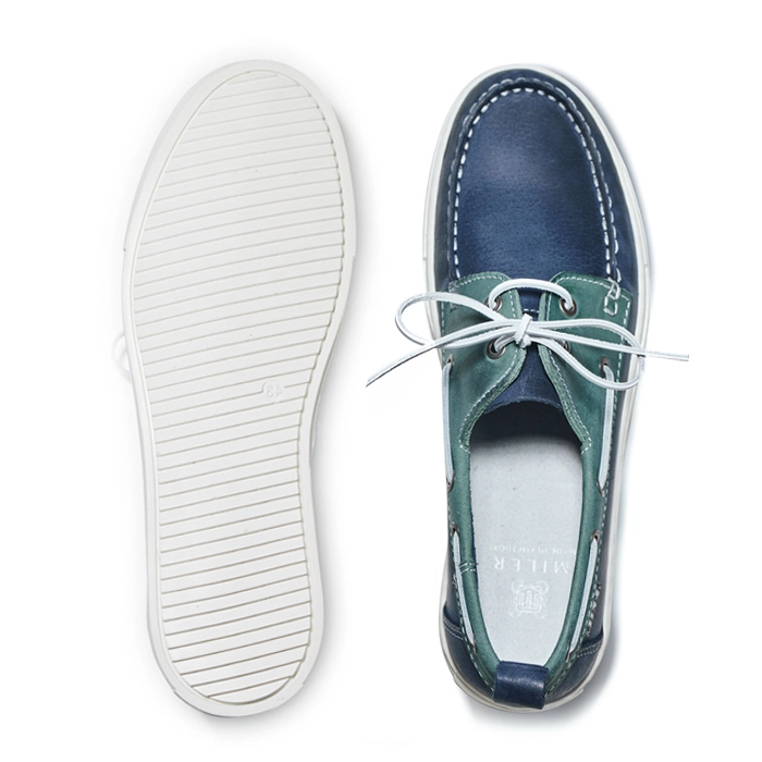 Granatowo-morskie buty żeglarskie z białą podeszwą