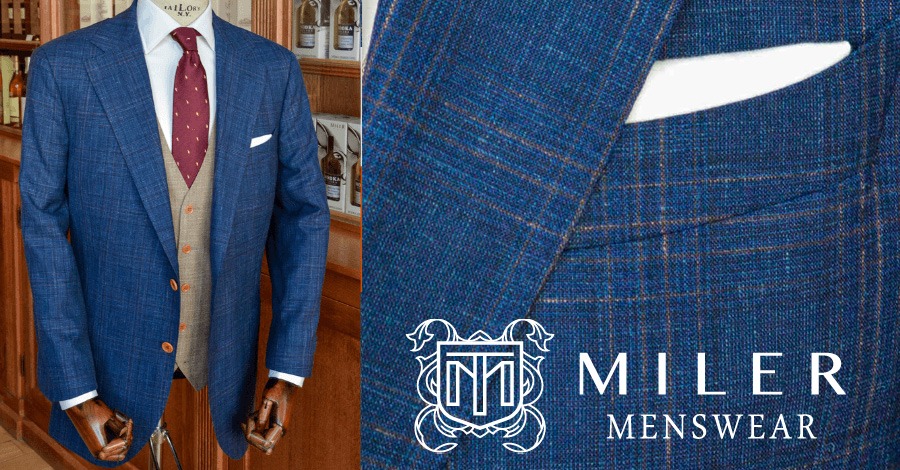 Blue suit with a subtle orange check pattern