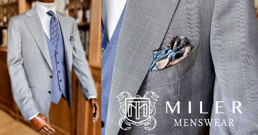Grey Prince of Wales check suit with a blue vest