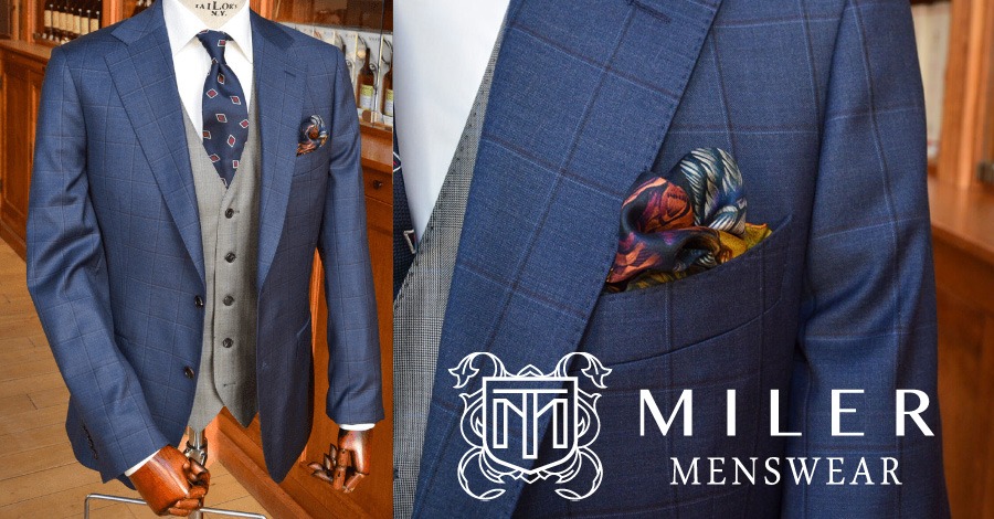 Blue windowpane check suit with a grey vest